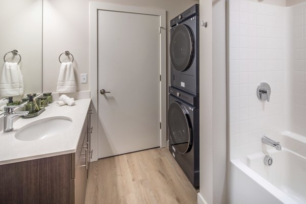 bathroom and laundry room at Prose Battle Ground Apartments