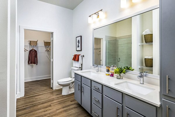 Bathroom featuring modern fixtures and elegant design in Legacy Encore Apartments