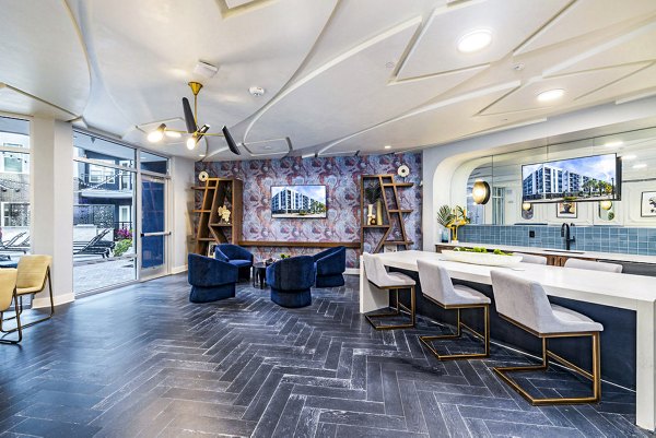 Modern clubhouse with elegant decor at Legacy Encore Apartments featuring luxury amenities and social spaces for residents