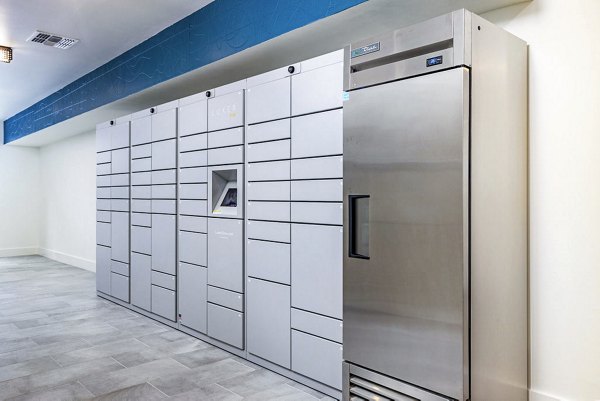 Parcel package pickup lockers at Legacy Encore Apartments, featuring secure storage solutions for residents in a modern luxury living community