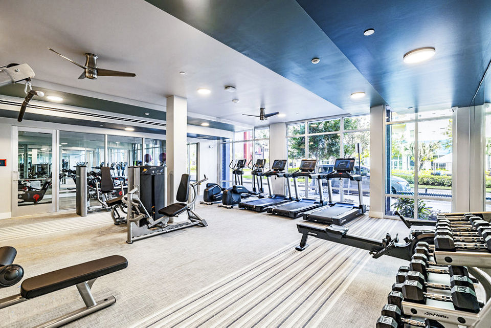 State-of-the-art fitness center with modern equipment at Legacy Encore Apartments