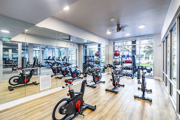 State-of-the-art fitness center with modern equipment at Legacy Encore Apartments