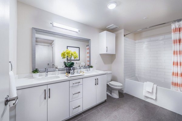 Modern bathroom with sleek fixtures at Aliso Apartments