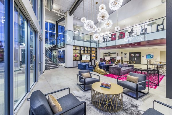 Elegant clubhouse lobby with modern furnishings at Aliso Apartments, a Greystar luxury property in a vibrant neighborhood