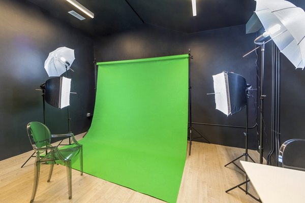 Clubhouse photo studio featuring stylish decor at Aliso Apartments, ideal for creative gatherings and modern luxury living experiences