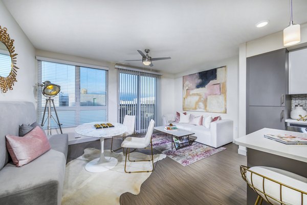 Spacious living room with modern decor at Aliso Apartments, a Greystar luxury apartment community