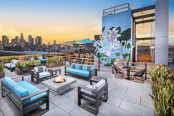 Modern patio with elegant seating at Aliso Apartments, offering a relaxing outdoor space
