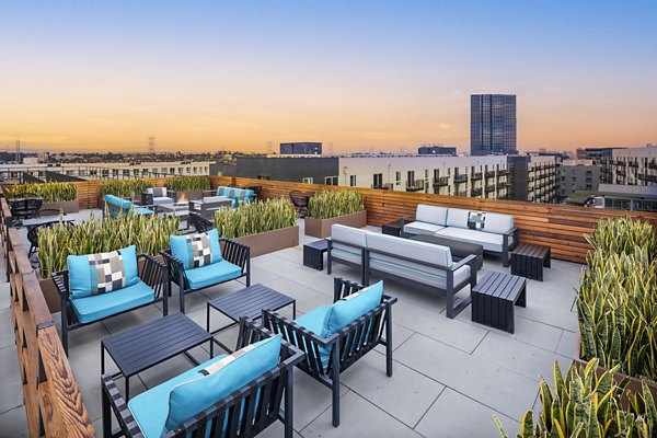 Spacious patio balcony with stylish furniture at Aliso Apartments