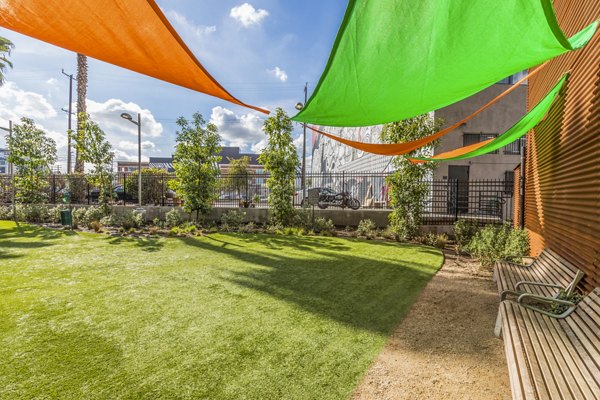 Expansive dog park at Aliso Apartments for residents and their pets to enjoy outdoor activities and exercise