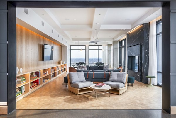 Elegant clubhouse with modern decor at FoundryLine Apartments, offering luxury amenities and social spaces for residents