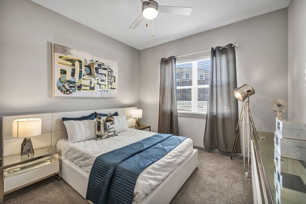 Cozy bedroom with modern decor at Haven at Mansfield Apartments