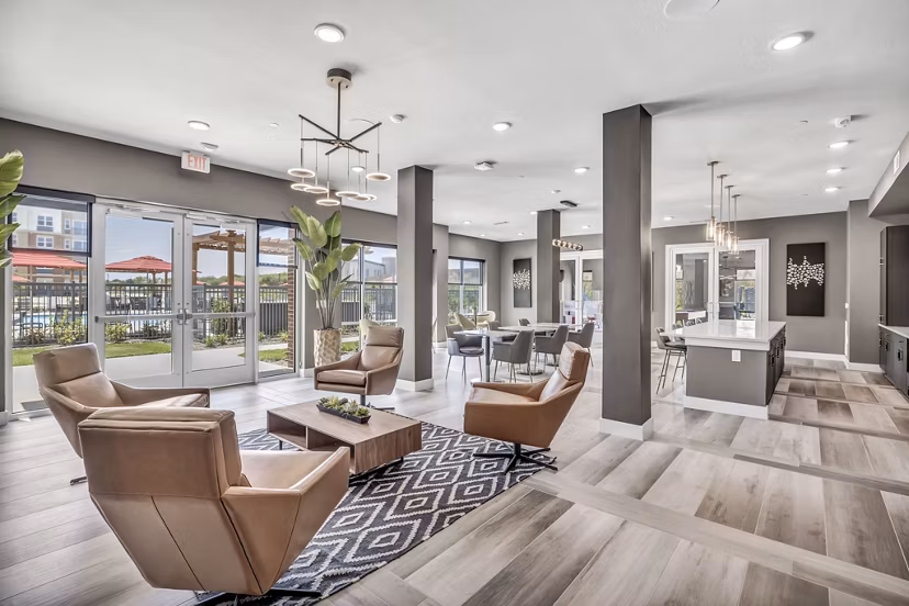 Clubhouse featuring modern decor and spacious seating at Haven at Mansfield Apartments