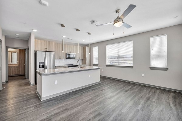 Modern kitchen with stainless steel appliances in Haven at Mansfield Apartments