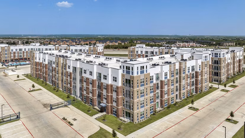 Haven at Mansfield: Scenic view of luxury apartments surrounded by greenery