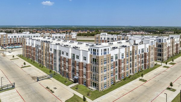 Haven at Mansfield: Scenic view of luxury apartments surrounded by greenery