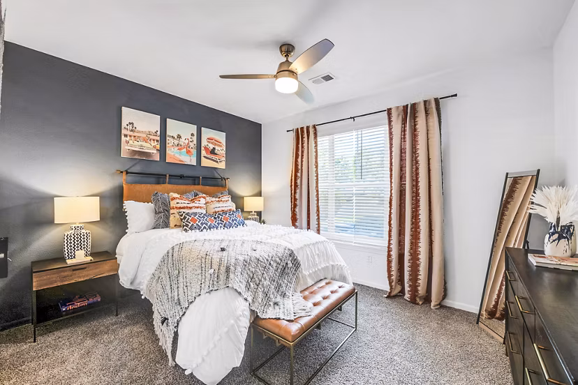 Bedroom featuring cozy decor and modern furnishings at Aventura Clear Creek Apartments
