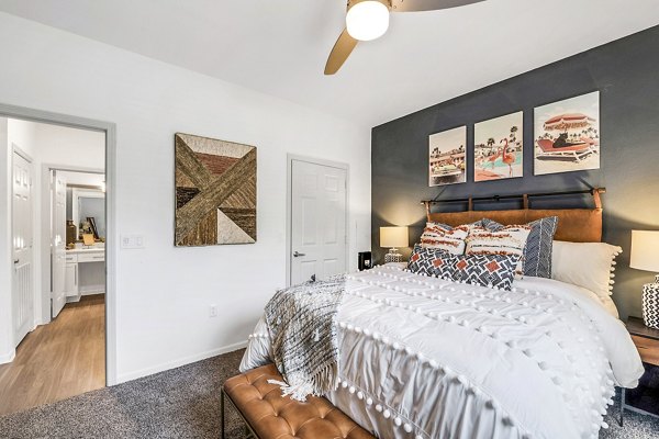 Spacious bedroom with modern furnishings at Aventura Clear Creek Apartments, featuring luxury living amenities in a prime location