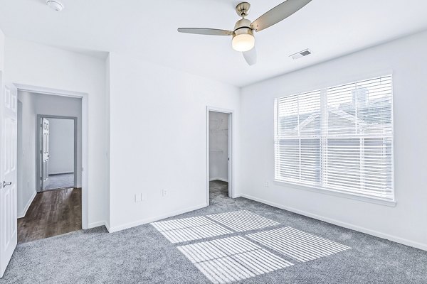 Cozy bedroom with modern furnishings at Aventura Clear Creek Apartments