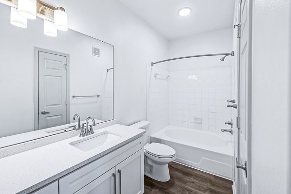 Stylish bathroom with modern fixtures at Aventura Clear Creek Apartments, featuring luxury amenities and sophisticated design elements