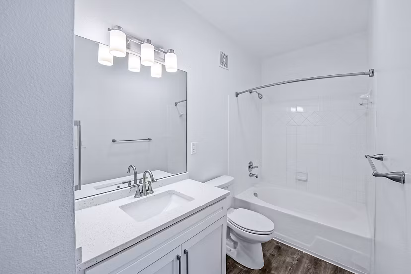 Modern bathroom with sleek fixtures in Aventura Clear Creek Apartments