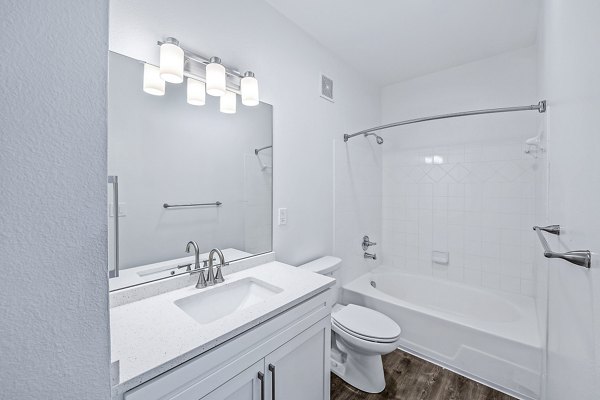 Modern bathroom with sleek fixtures in Aventura Clear Creek Apartments