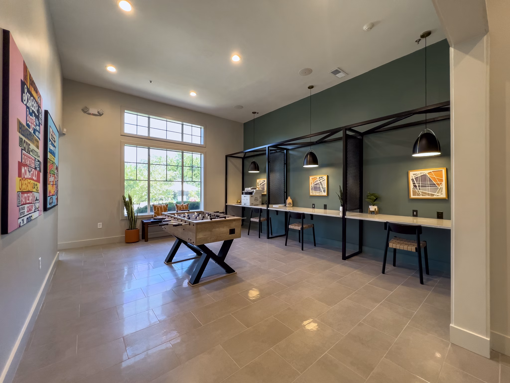 Game room featuring pool table and arcade games at Aventura Clear Creek Apartments: a luxury space designed for entertainment and relaxation