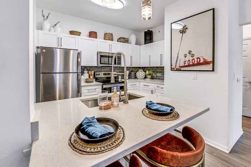 Elegant dining room with modern furnishings at Aventura Clear Creek Apartments, ideal for luxury living