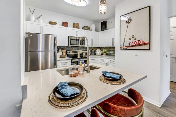 Elegant dining room with modern furnishings at Aventura Clear Creek Apartments, ideal for luxury living