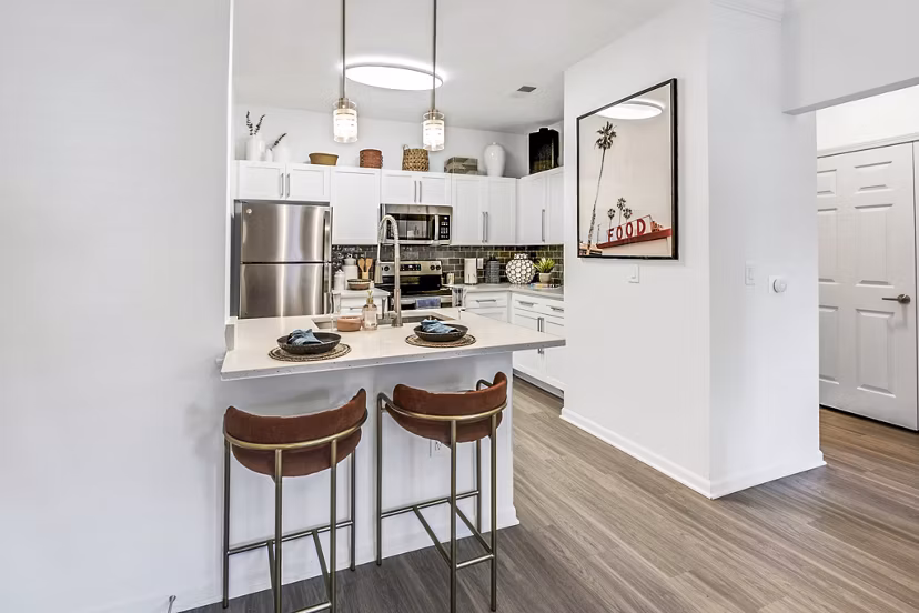 Elegant dining room with modern decor at Aventura Clear Creek Apartments, offering a luxurious living experience in a beautiful setting