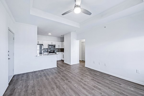Living room featuring modern furniture and natural light at Aventura Clear Creek Apartments