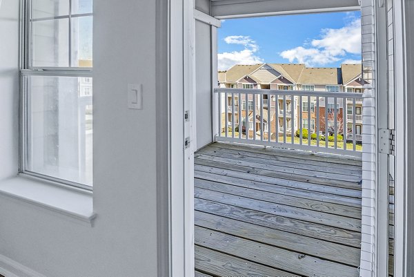 Spacious patio with outdoor seating at Aventura Clear Creek Apartments, perfect for relaxation and entertaining in a luxury setting