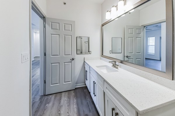 Bathroom with modern fixtures and luxury finishes at Aventura Falcon Valley Apartments