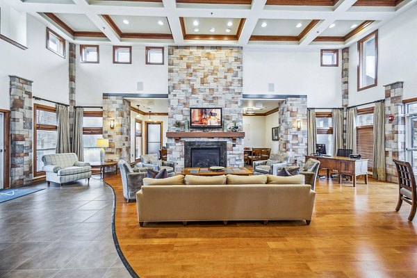 Elegant clubhouse featuring stylish furnishings at Aventura Falcon Valley Apartments