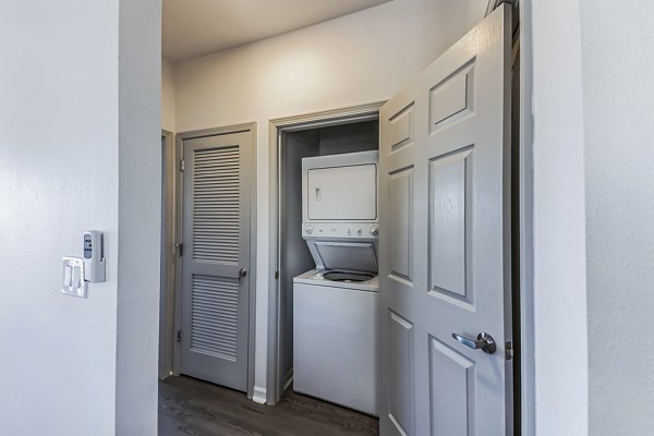 laundry room at Aventura Falcon Valley Apartments