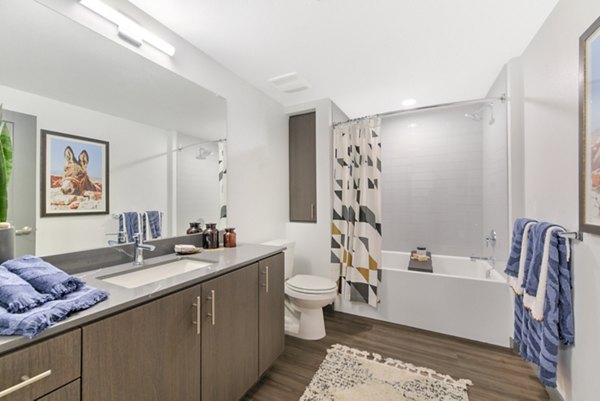 Bathroom featuring modern fixtures and spacious layout at Persea Apartments, Greystar luxury apartments