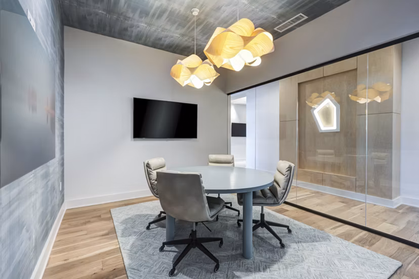 Modern meeting facility with sleek furnishings at Ello House Apartments
