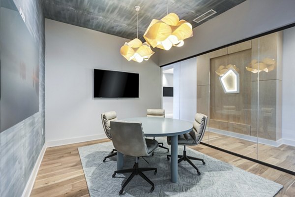 Modern meeting facility with sleek furnishings at Ello House Apartments