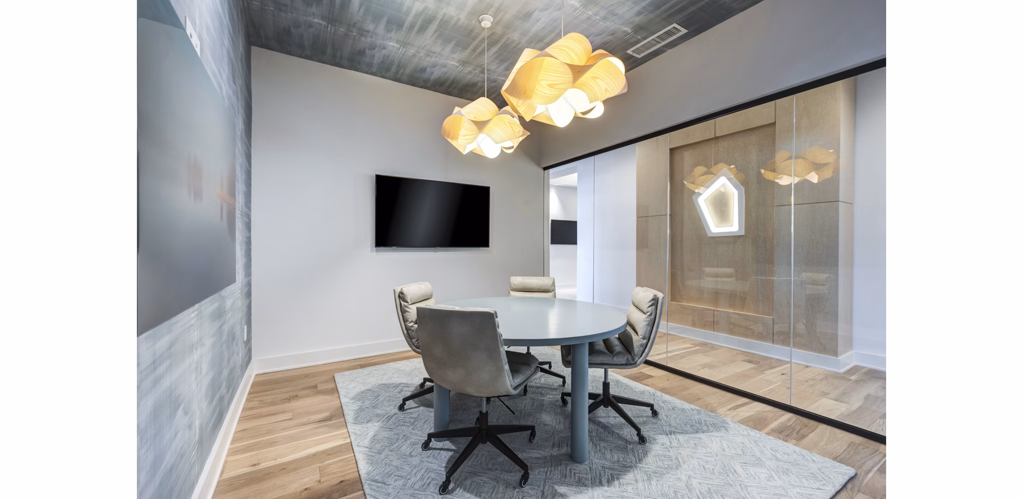 Modern meeting facility with sleek furnishings at Ello House Apartments