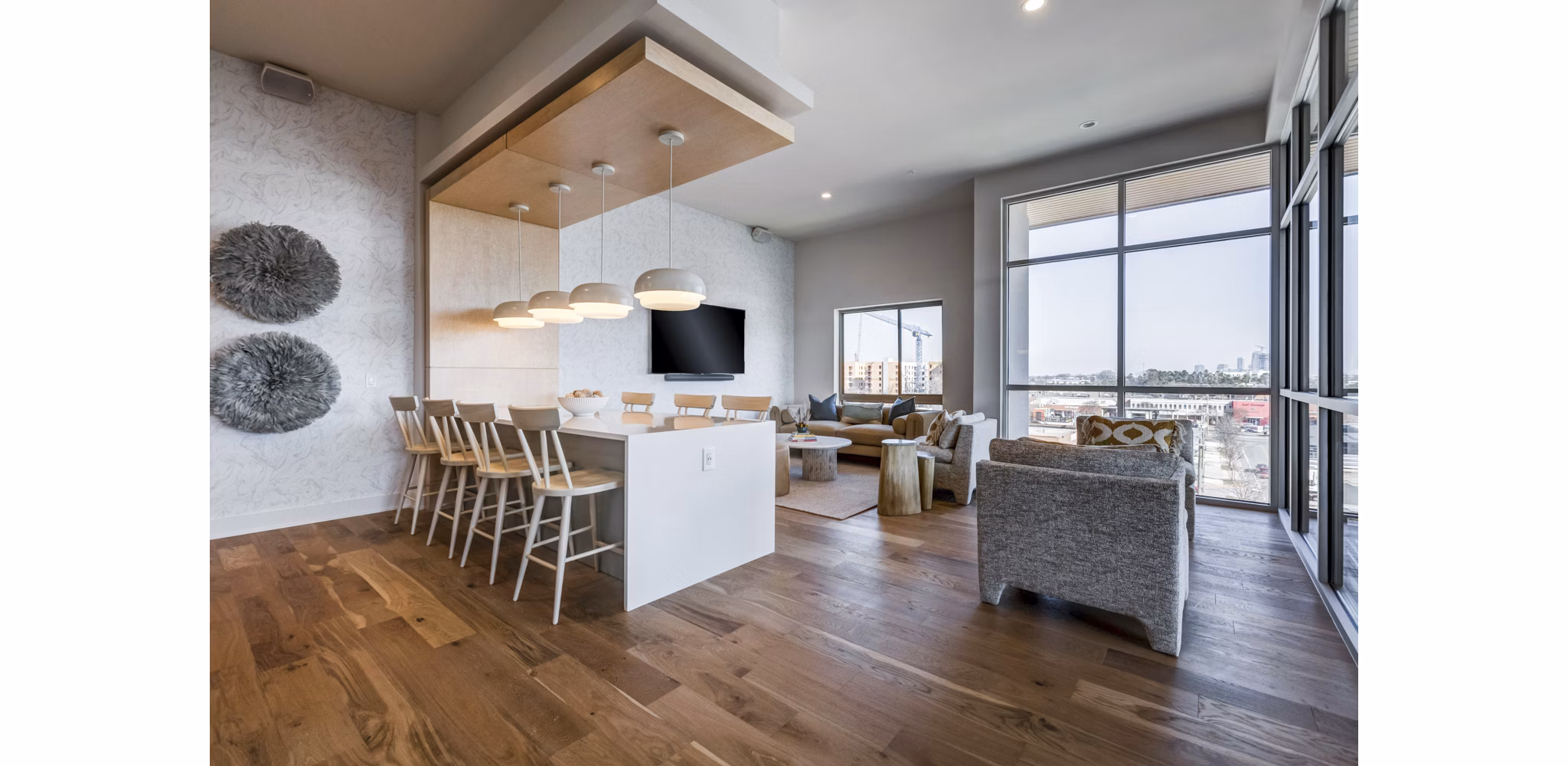 Modern clubhouse with cozy seating area at Ello House Apartments