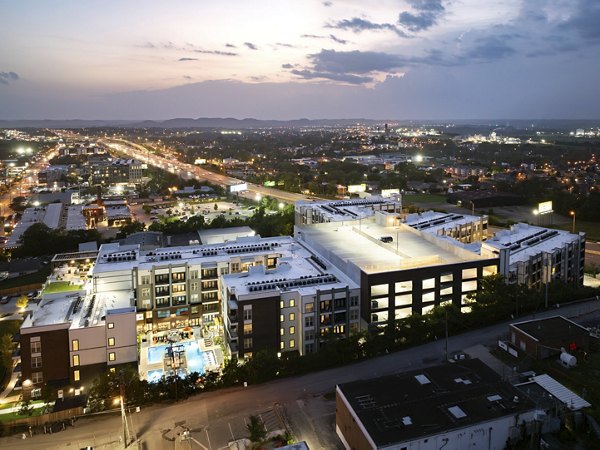 Rye Charlotte Ave Apartments: Luxury modern building with sleek facade, offering upscale living in prime Charlotte location