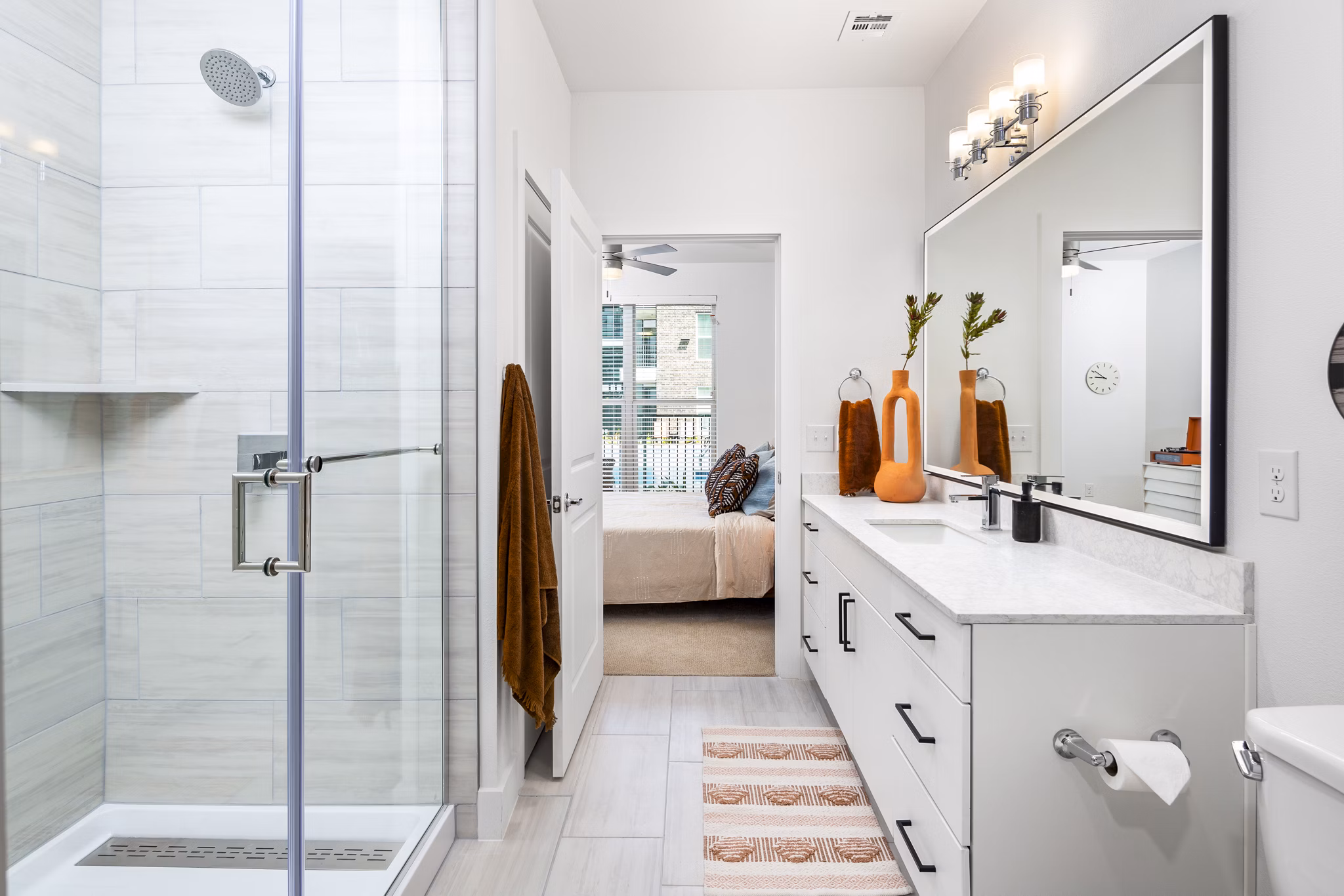Modern bathroom with stylish fixtures at Rye Charlotte Ave Apartments