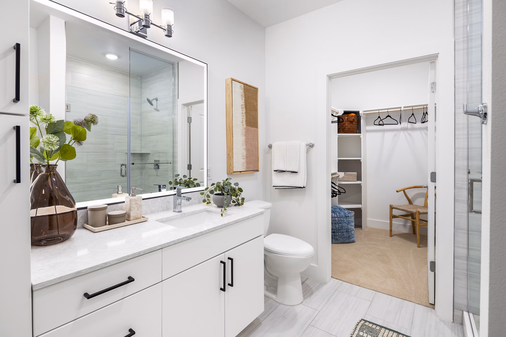 Modern bathroom with luxurious fixtures at Rye Charlotte Ave Apartments