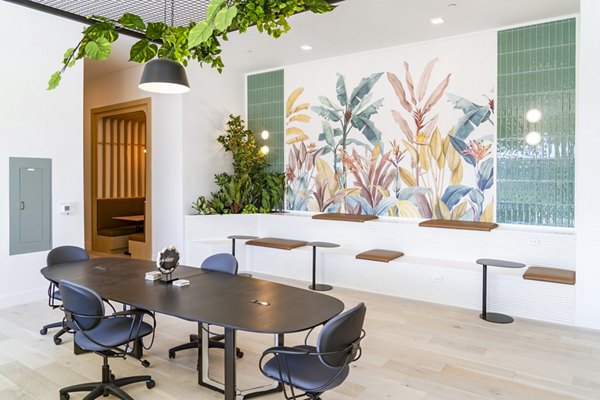 Rye Charlotte Ave Apartments: Stylish clubhouse featuring modern seating and decor