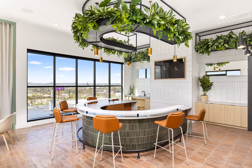 Modern clubhouse with stylish seating at Rye Charlotte Ave Apartments