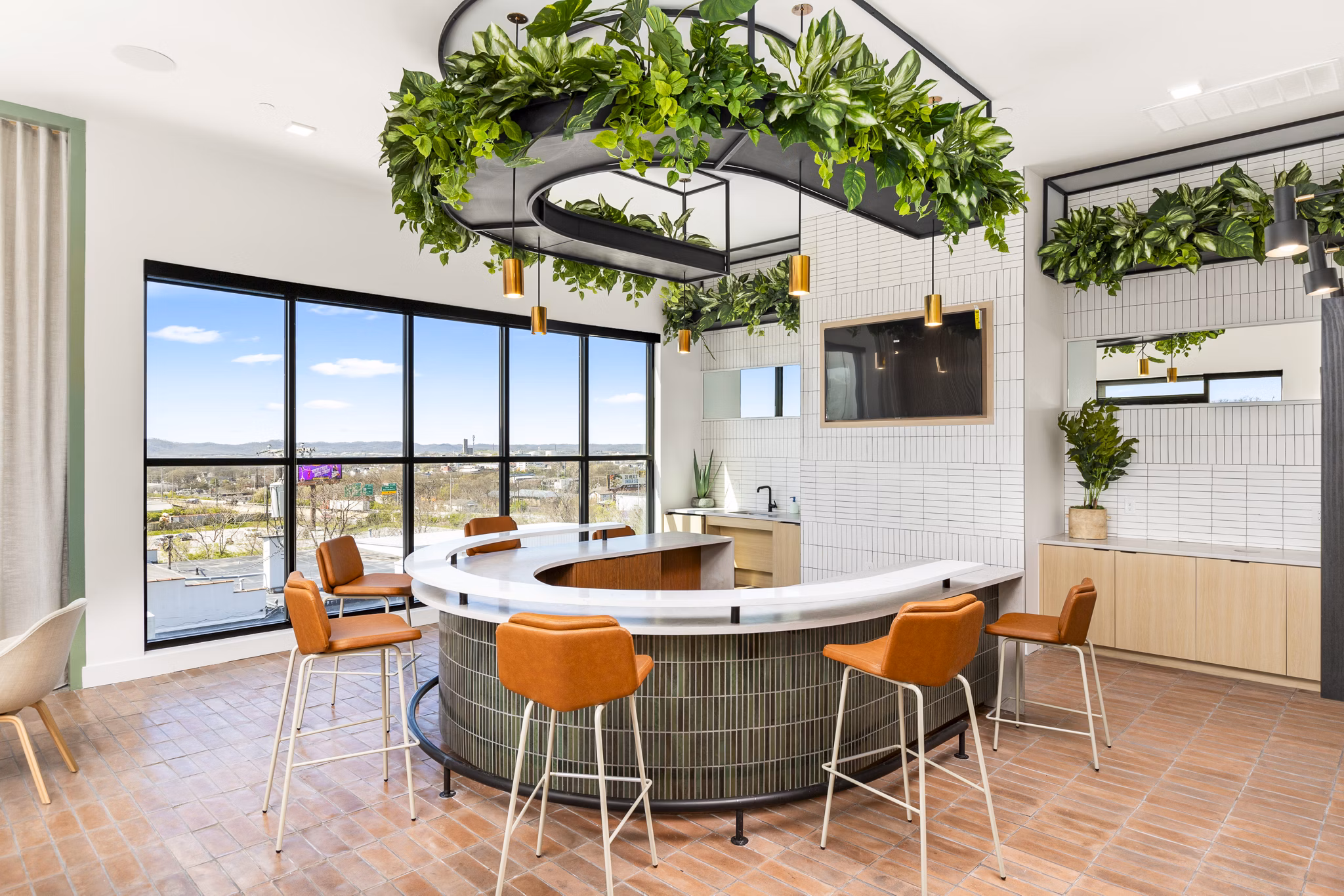 Modern clubhouse with stylish seating at Rye Charlotte Ave Apartments