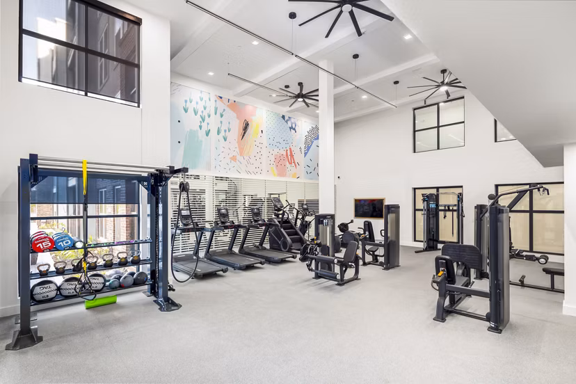 Fitness center with state-of-the-art equipment at Rye Charlotte Ave Apartments, perfect for active living and luxury apartment lifestyle seekers