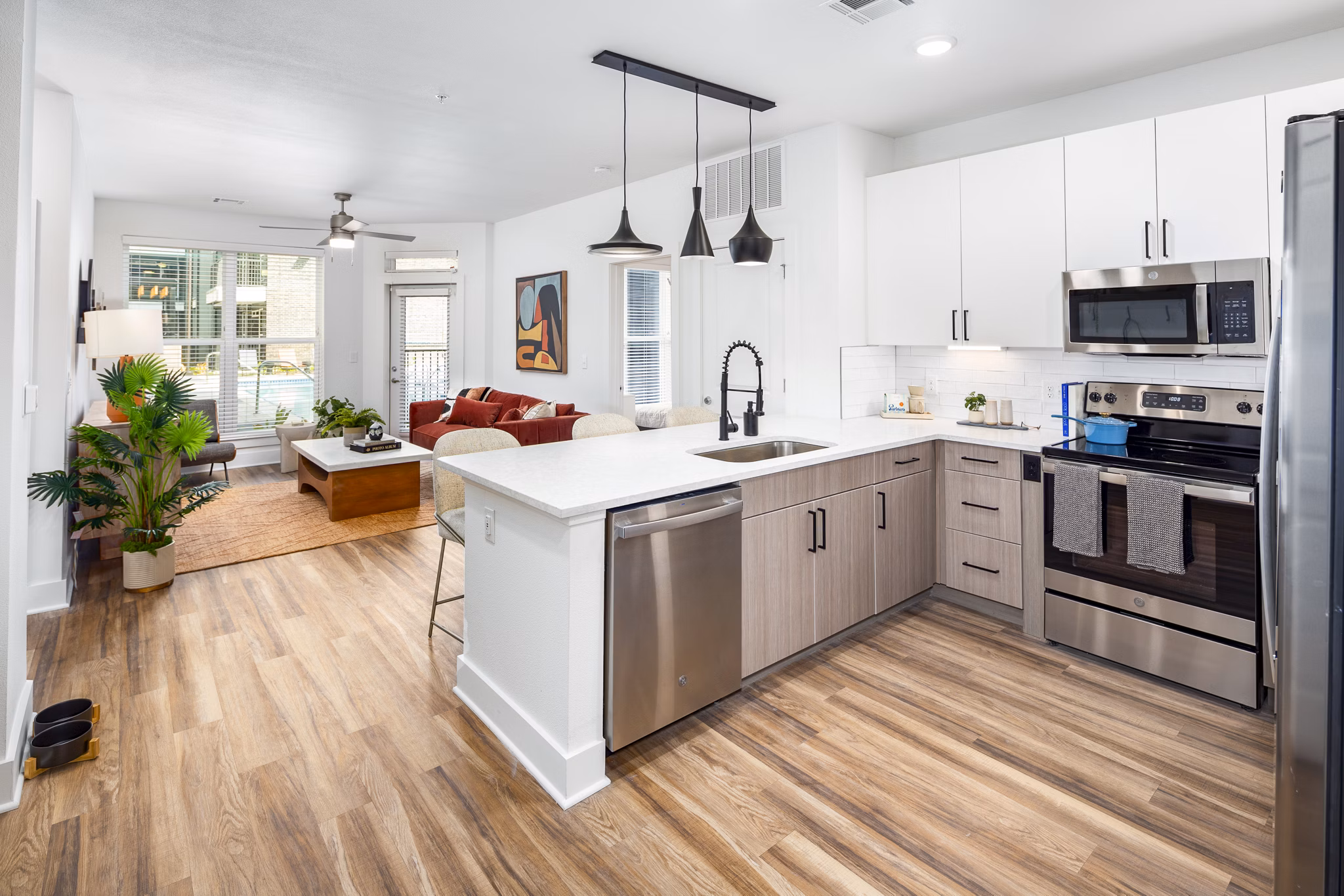 Modern kitchen with stainless steel appliances in Rye Charlotte Ave Apartments, luxury living by Greystar