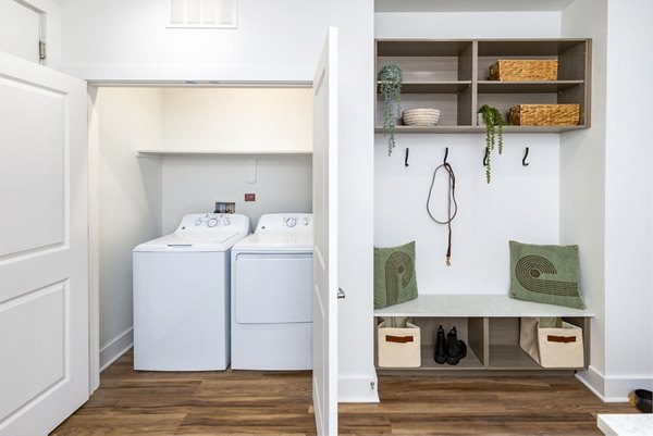 Laundry room with modern appliances at Rye Charlotte Ave Apartments in Greystar luxury apartment community