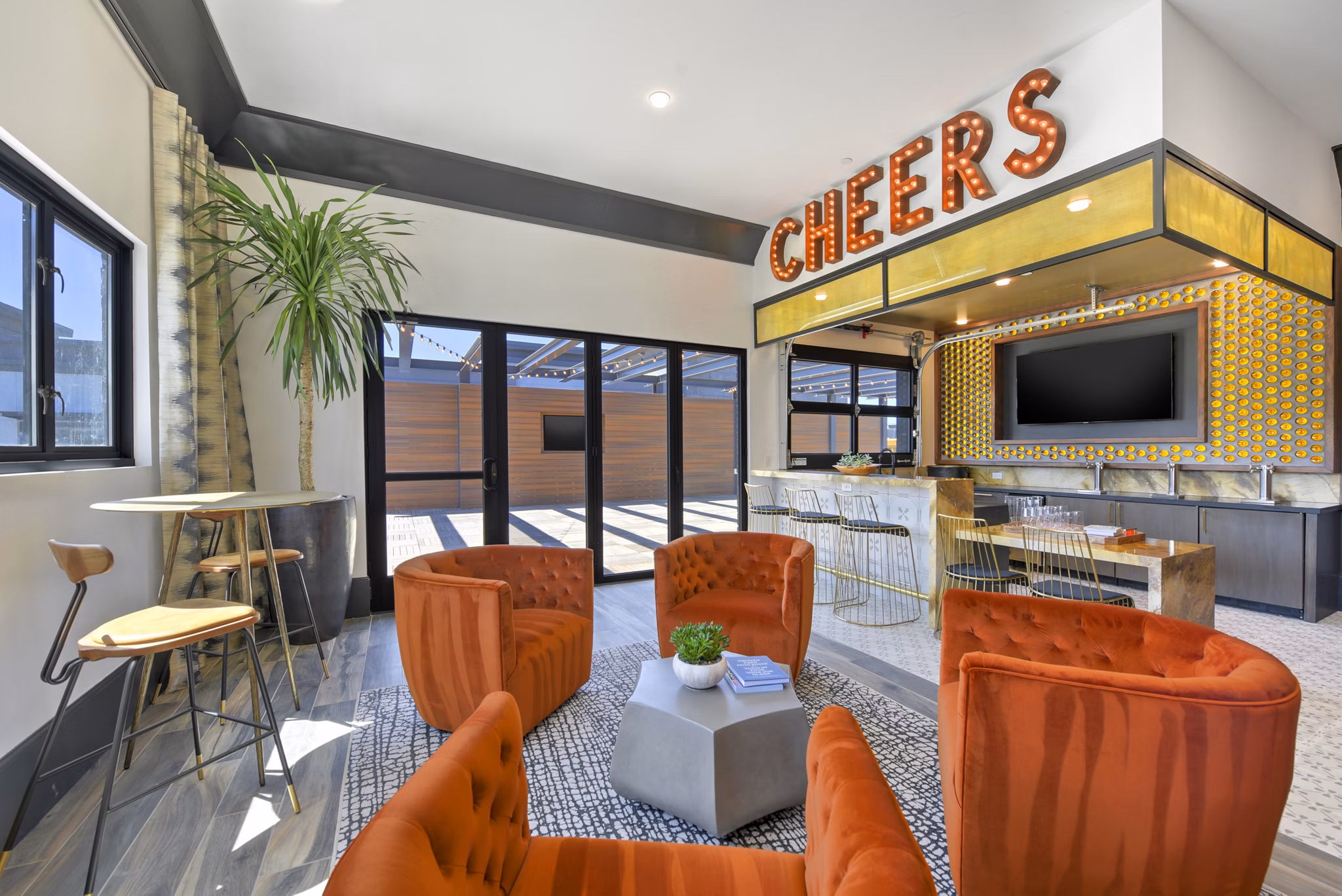 Modern clubhouse featuring stylish seating and open spaces at Persea Apartments