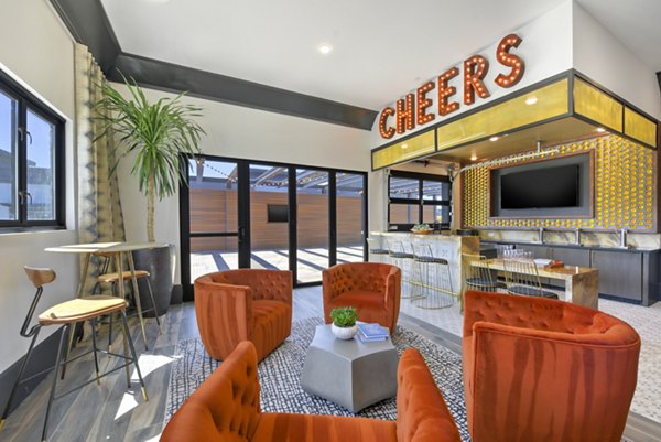 Modern clubhouse featuring stylish seating and open spaces at Persea Apartments
